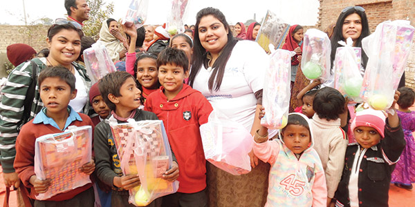 group of children holding gifts